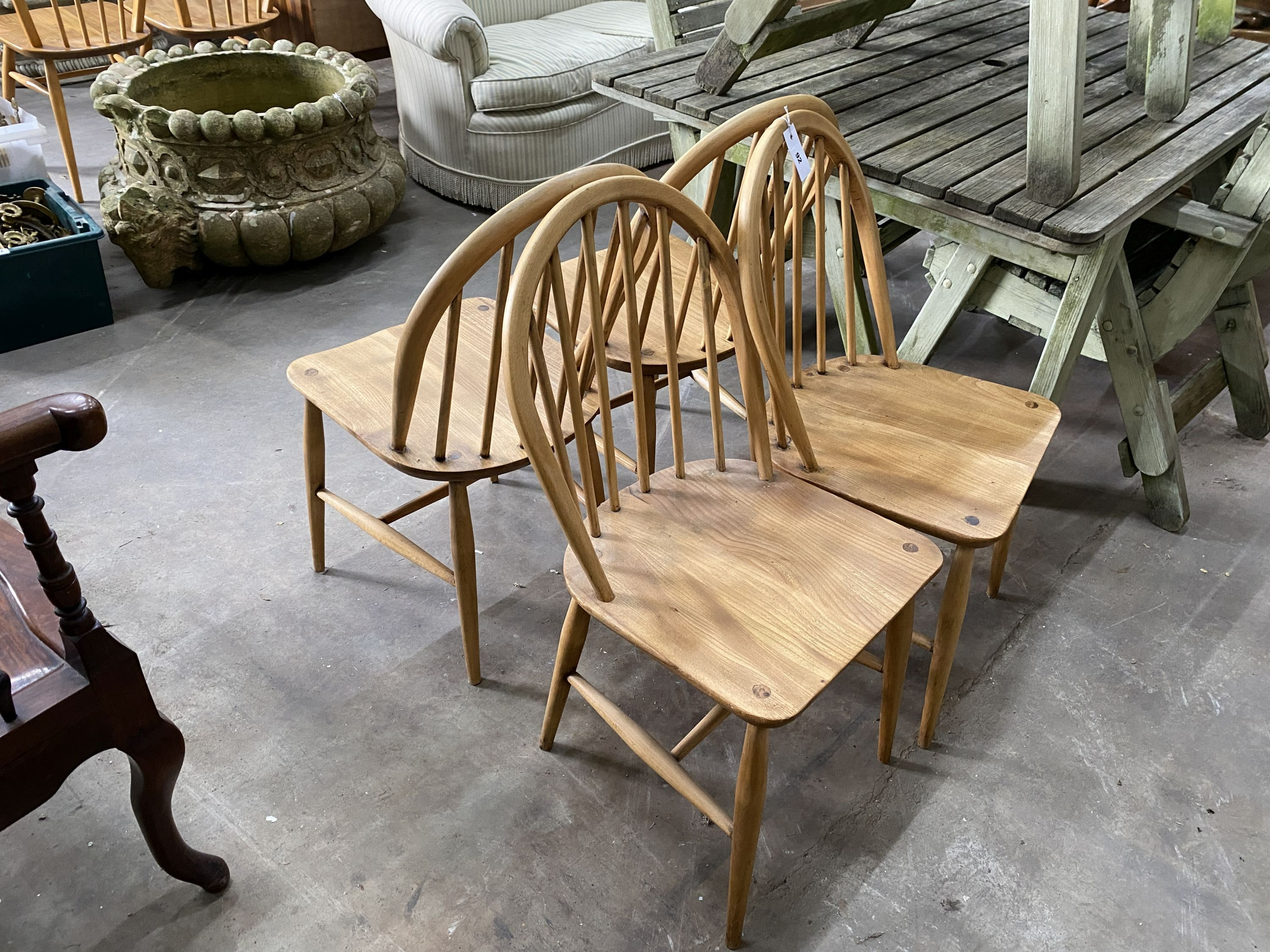 A set of four 1950's Ercol elm and beech chairs
